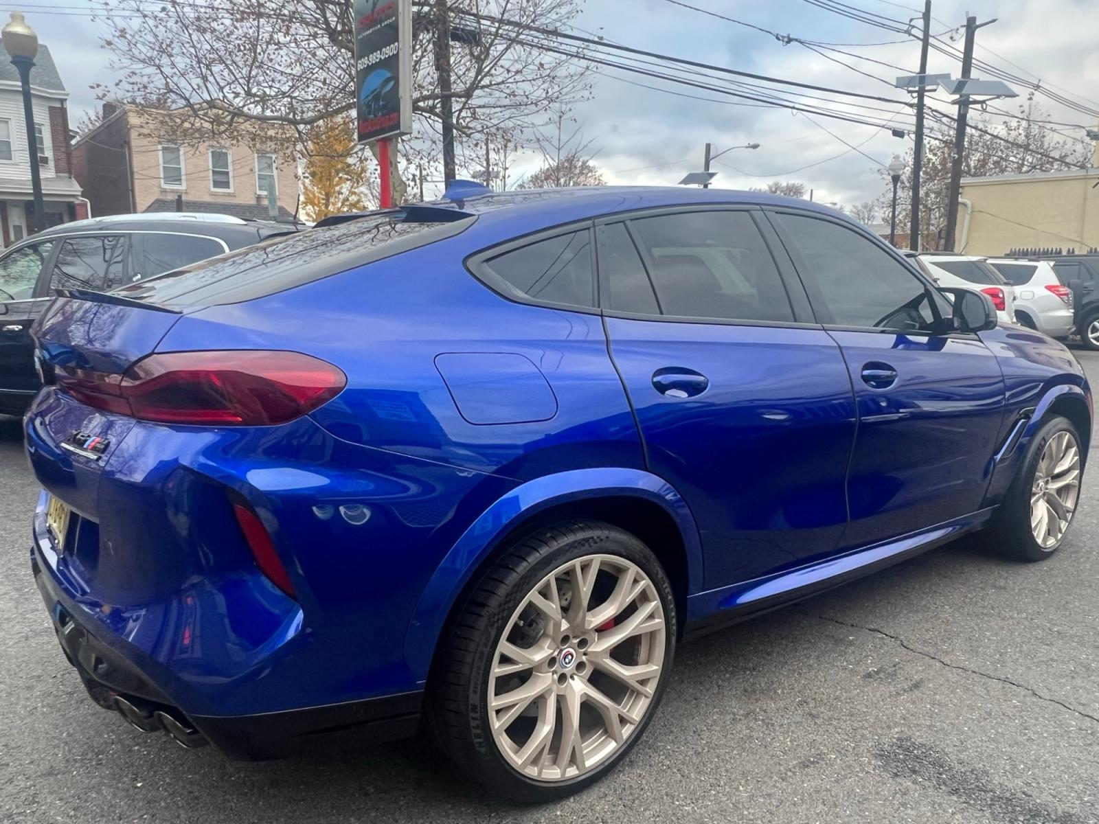 2022 Blue /Red/Black BMW X6 M Base (5YMCY0C07N9) with an 4.4L V8 DOHC 32V engine, 8A transmission, located at 1018 Brunswick Ave, Trenton, NJ, 08638, (609) 989-0900, 40.240086, -74.748085 - Holy Cow and Wow!!...That is the description on this absolutely stunning BMW X6 M Competition! Ordered by Anthony himself with the best color choice of Marina Bay Blue metallic and Red Interior to stand out on the road and to any enthusiast of the BMW X series! Executive Pkg. includes Remote Start, - Photo #1